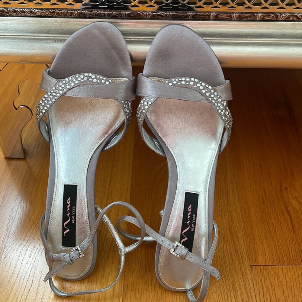 Silver color sandals in size 8.5 . Nina New York brand.